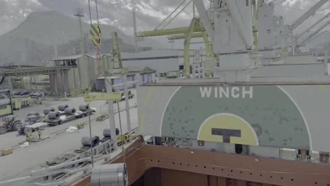 Using the ships cranes for cargo operations in port Stock Footage 328985469