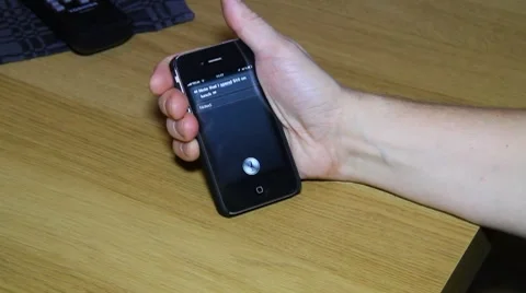 Using Siri on an iPhone 4S to make a note Stock Footage 8950134