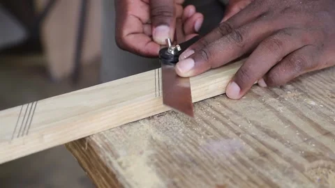 Using a sliding bevel to draw parallel lines on stock Stock-Footage 163317719