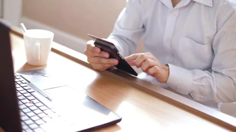 Using smart cell phone for online shopping with credit card on living room Stock Footage 265928089