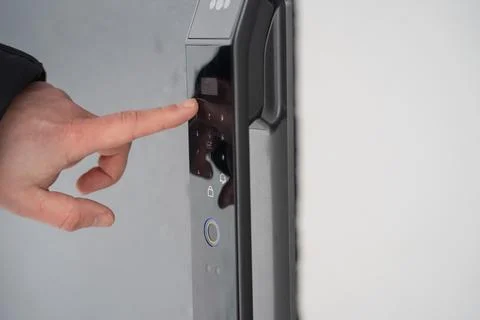 Using a smart door lock outdoor Stock Photos