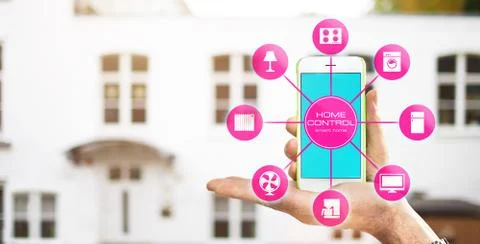 Using smart home app on phone. Smart home control concept. Stock Photos