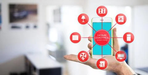 Using smart home app on phone. Smart home control concept. Stock Photos