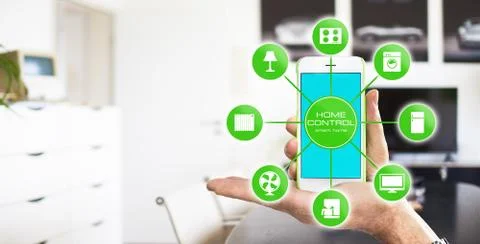 Using smart home app on phone. Smart home control concept. Stock Photos