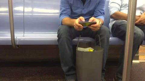 Using smart phone and tablet at subway Stock Footage 51841209