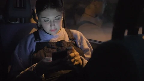 Using smart phone in car 스톡 동영상 129924166