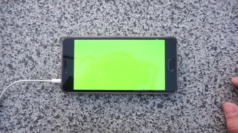 Using a Smart Phone with a Green Screen Stock Footage 75752034