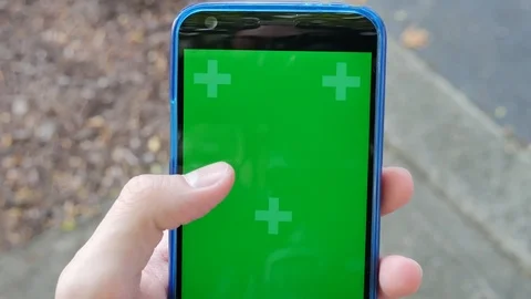 Using a smart phone green screen 스톡 동영상 90906847