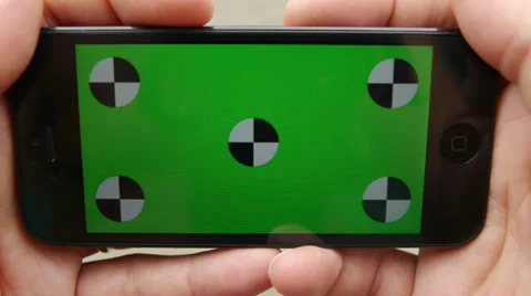 Using a smart phone at the park. Chroma Key Stock Footage 33339829