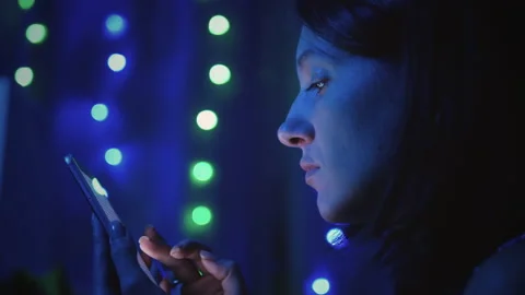 Using smartphone on bokeh background Stock Footage 141679518