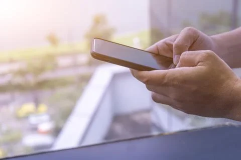 Using smartphone on the building work cityscape Stock Photos