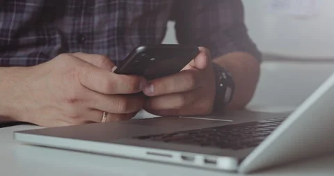 Using smartphone for business communication Stock Footage 320945588