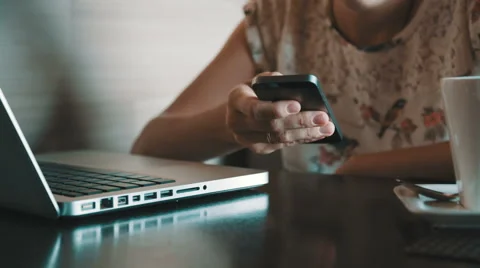 Using smartphone in cafe Stock Footage 53768028