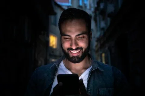 Using Smartphone in Dark Street Stock Photos