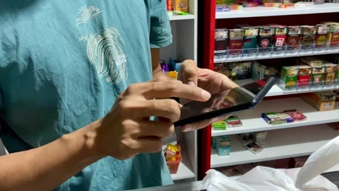 Using Smartphone for Digital Shopping Transaction Video stock 345140594