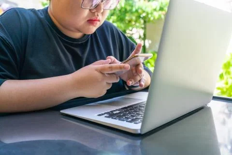 Using smartphone in the garden Stock Photos