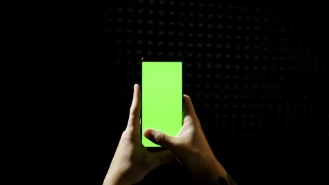 Using Smartphone with Green Mock-up Screen green chroma key screen, hand ge.. Stock Footage 272780545