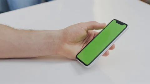 Using smartphone with green screen Stock Footage 104672541