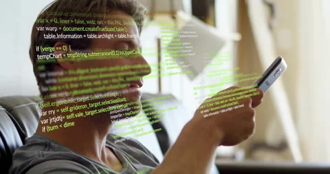 Using smartphone, man with green coding animation overlaying his profile Stock Footage 306267195