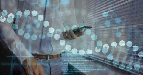Using smartphone manager viewing molecular chain, hex chemical overlays and code Stock Photos