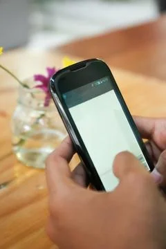 Using a smartphone Stock Photos