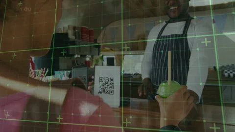 Using smartphone QR code, customer paying at cafe counter with animation overlay Stock Footage 304763576