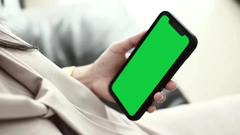 Using smartphone on sofa Stock Footage 310864898