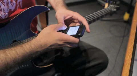 Using smartphone in the studio Stock Footage 5701183