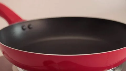 	using a strainer to make scrambled eggs and serving in a white plate Video stock 133815127