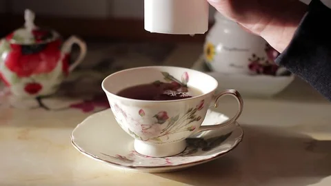 Using a sweetener, close-up Stock Footage 85091725