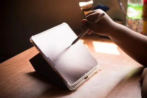 Using tablet and technology in the morning Stock Photos