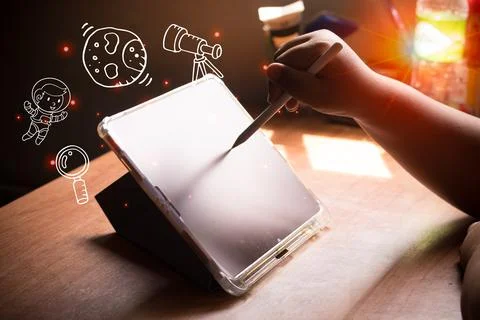 Using tablet and technology in the morning.Ideas for children's education Foto stock