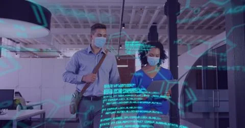 Using tablet, casual and scrub-clad colleagues viewing holographic overlay in Foto stock