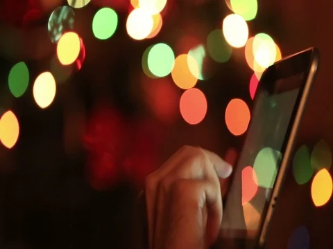 Using tablet with christmas background Video stock 73622613