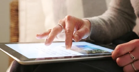 Using tablet closeup Video stock 81485533
