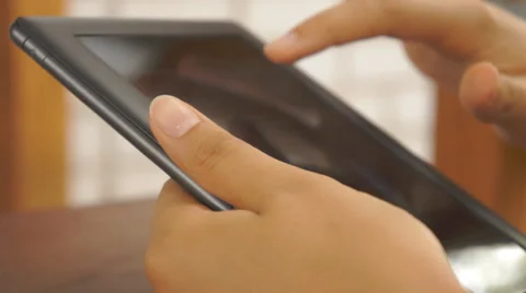 Using tablet computer 스톡 동영상 27394488