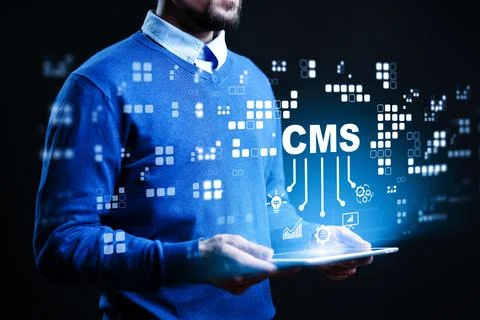 Using a tablet to manage content in a content management system during a Stock Photos