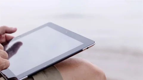 Using tablet in nature background. Stock Footage 70882077