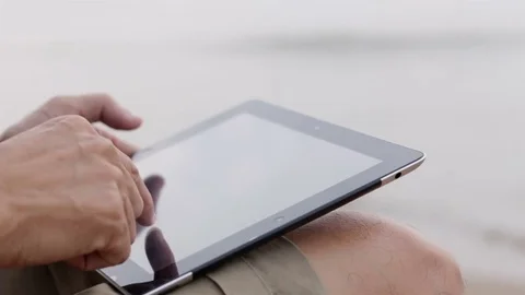 Using tablet in nature background. Stock Footage 70882883