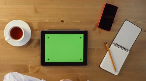 Using Tablet PC with a Green Screen Stock Footage 60213753