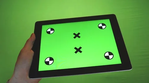 Using Tablet PC with Green Screen on a Green Background Stock-Footage 64557690
