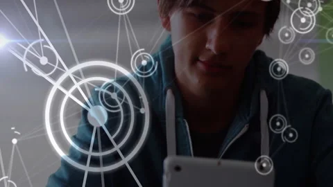 Using tablet, person with hoodie over futuristic network connections animation Stock Footage 303685315