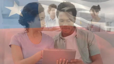 Using tablet, students in school with Chilean flag animation in classroom Stock Footage 326629273