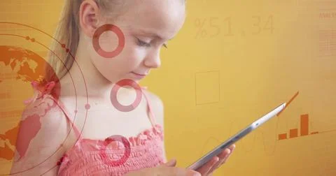 Using tablet, young girl with data visualization image over orange background Stock Photos