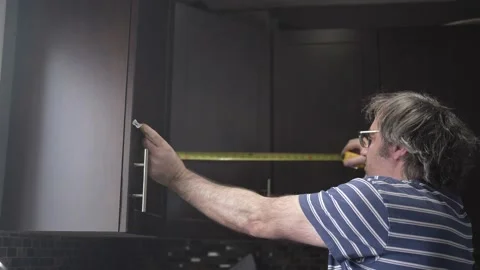 Using Tape Measure in a Home Kitchen Home Repair Manual Job Vídeo Stock 236641831