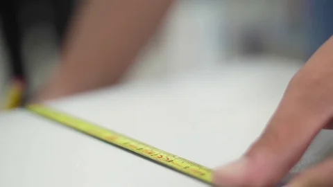Using tape measure for measuring slow motion Vídeo Stock 77919931