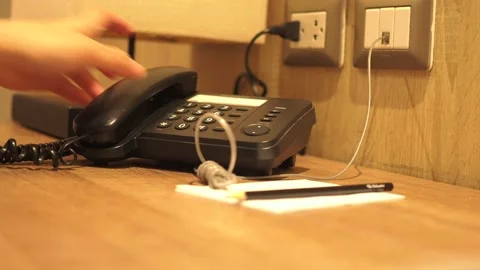 Using telephone and taking notes Stock Footage 129536063