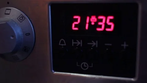 Using timer of kitchen oven close up Stock Footage 76159513