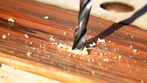 Using tools on a word bench in slow motion Stock Footage 95670418