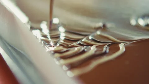 Using a toothpick to decorate chocolate bar Stock Footage 274633905